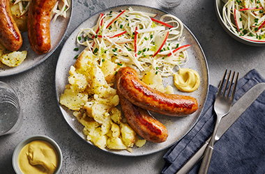 Sausages with fennel, apple and cabbage slaw