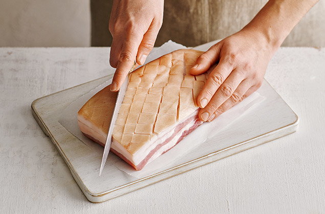Scoring the pork