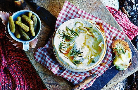 Bonfire Night snacks don't come much more tempting than this - a whole Camembert baked in the oven until gorgeously gooey and stuffed with garlic and herbs for extra flavour. Rustle up this easy recipe and serve alongside some crunchy bread