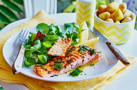 Cooking salmon on the BBQ brings out that beautiful smokiness that the fish is known for. Combine with some refreshing lemon and herbs and serve with a crispy skin for a healthy, textured and flavourful dish.