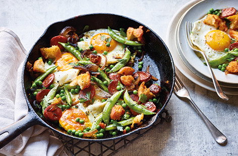 This easy pan-fried chorizo hash is the perfect last-minute meal. Smoky chorizo, crisp chunks of ciabatta and vibrant peas are finished with a fried egg for a quick and easy 20 minute summer recipe that works for brunch, lunch or dinner.