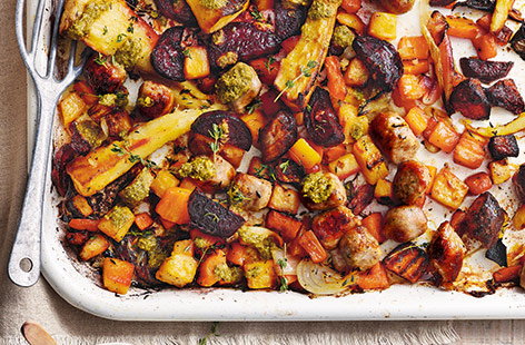 Sausage and veg traybake with pesto sauce