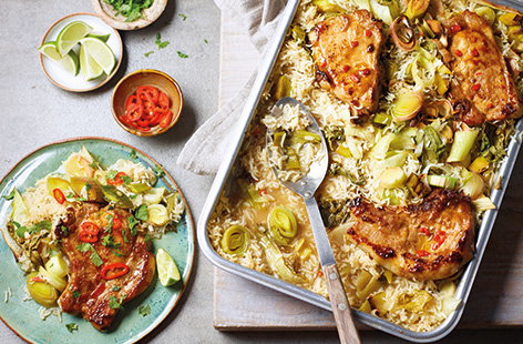Try this spicy pork traybake for a stress-free family meal – put everything in one large roasting tin and let the oven do the work. Fluffy lemongrass rice with leeks and pak choi is topped with juicy pork chops marinated in chilli, lime and ginger.