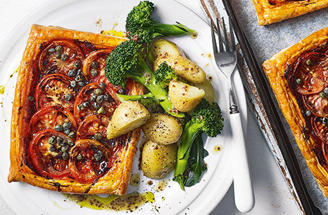 Celebrate juicy tomatoes at their summer best with this simple tomato tart recipe, perfect for an easy summer lunch or weeknight dinner. 