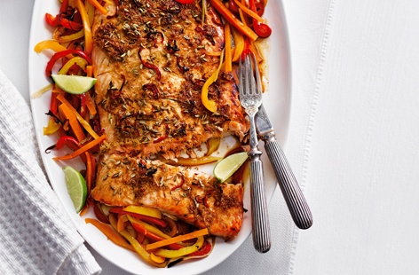 An alternative main for Christmas dinner or even for a festive get-together, your guests will be wowed by this vibrant fish centrepiece. Fragrant Asian spices and zingy, colourful vegetables complement salmon that is cooked to juicy, flaky, pink perfection
