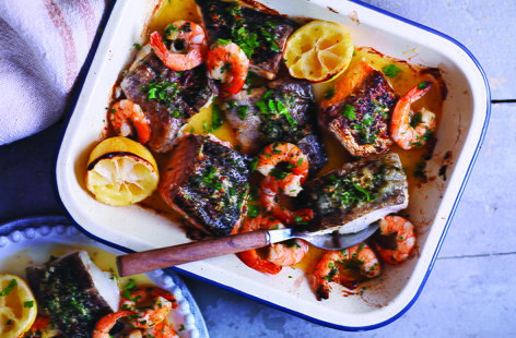 Served with a zesty gremolata (an Italian herb condiment) and roasted lemons, this rustic mixed seafood roast full of flavour and super easy to make.