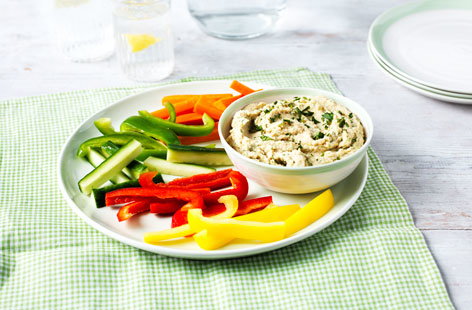 Making homemade houmous is easier than you think, you just need a stick blender or food processor. This recipe includes lime, paprika and fragrant, fresh coriander. Serve with toasted, sliced pitta bread and crudités.