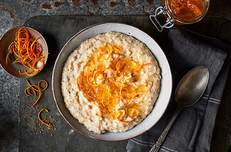 Combine two classic breakfasts into one with this 'marmalade on toast' inspired porridge recipe. Stir buttery flax seeds into the porridge and finish with a swirl of marmalade and fresh orange zest for a healthy breakfast idea.